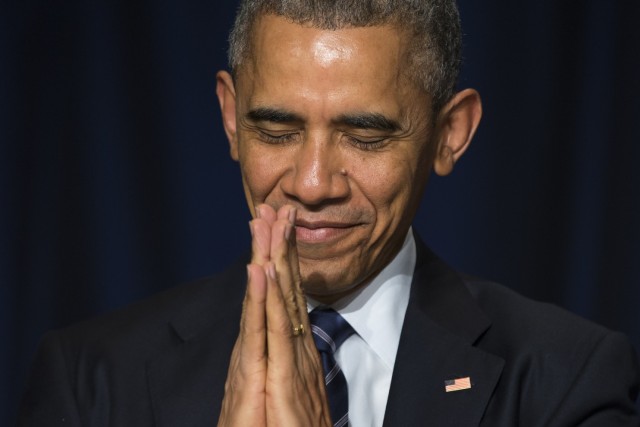 Obama Namaste at Prayer Breakfast